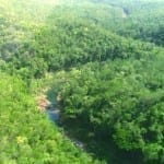Aerial view of property at creek bend